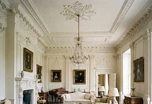 Classic interior with abundant stucco, columns, and decorative ceiling