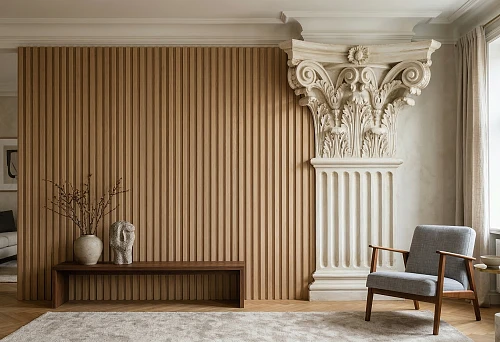 Slat wall panel in a living room interior with a classical capital, wooden console, and upholstered armchair
