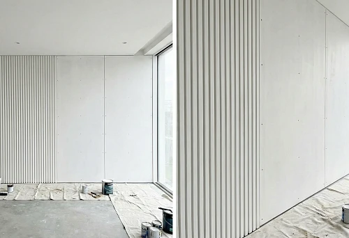 wall finishing with MDF battens for painting in a modern interior