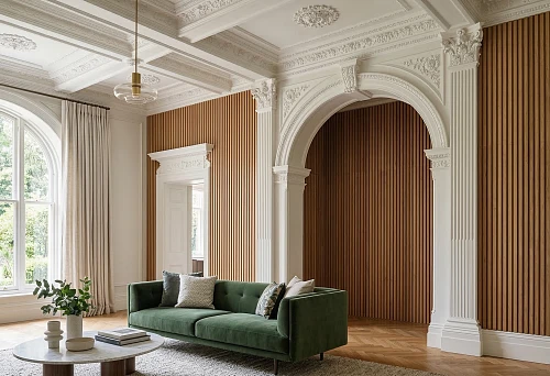 An interior where wooden wall slats combine with expressive architectural decor