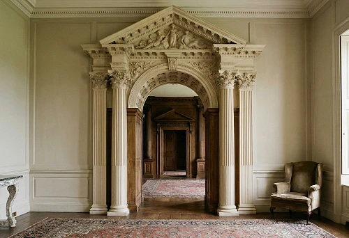 Classic Interior with a Luxurious Arched Opening, Adorned with Columns Featuring Corinthian Capitals and an Ornate Pediment