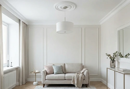 Polyurethane molding in a small apartment: a bright living room with wall moldings and a ceiling rosette