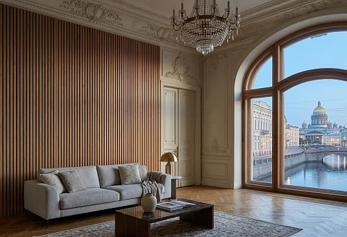 Slat wall panels in Saint Petersburg in an interior with high ceilings, stucco molding, and a crystal chandelier