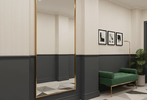 Boutique-style hallway with a full-length mirror in a gold frame and a tall dark baseboard panel along the walls