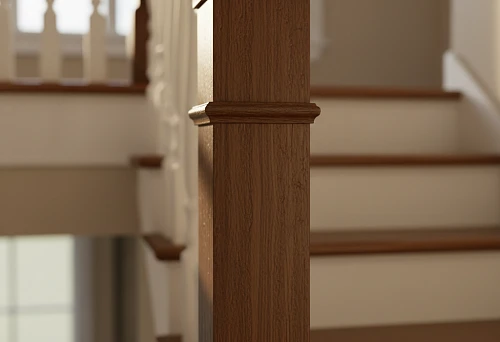 Close-up of a solid oak wooden baluster on a staircase with white railings and steps, built to safety standards and harmoniously integrated into the interior