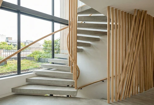 Round molding 50 mm in architecture: slat partition and stair railing in modern interior