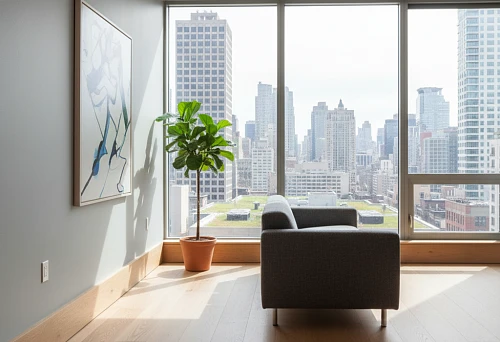 Modern Urban Interior with Panoramic Windows and Light Wooden Baseboard Against Cityscape Background