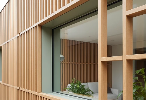 Facade with vertical wooden reiki and bars forming a rhythmic architectural structure