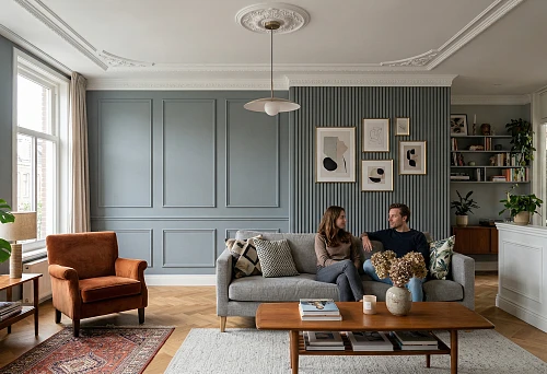 Wall molding for the living room in an interior with decorative panels and classic trim
