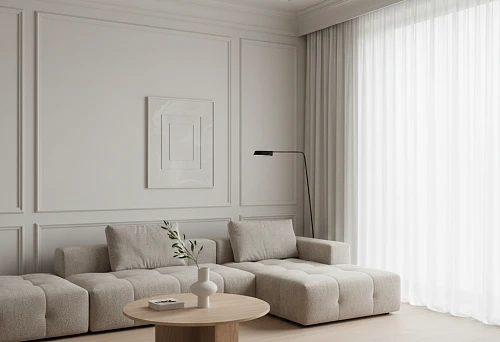 Minimalist living room with designer furniture and neoclassical molding on the walls