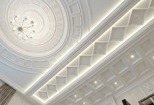Polyurethane ceiling panels and ceiling decorations &mdash; a diagonal composition of coffers and moldings with hidden lighting