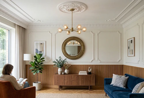 Decorative slatted wall panels and polyurethane moldings in a modern living room interior with soft furniture and a wooden console