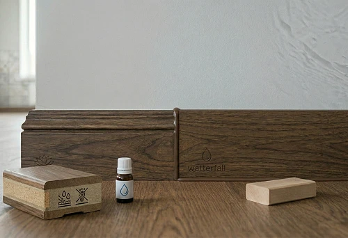 Wooden skirting board for bathroom and kitchen: moisture-resistant coating and sealing of the joint at the wall