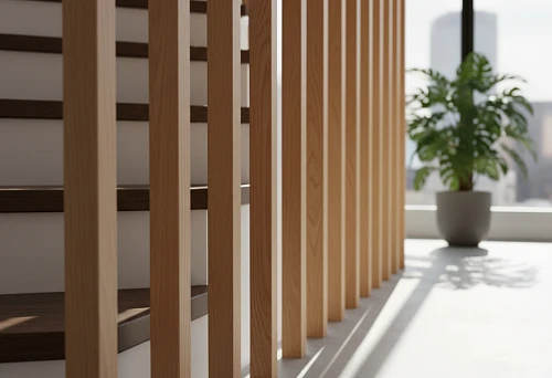 Modern beech balusters with smooth wood texture along the staircase in an interior with a panoramic window