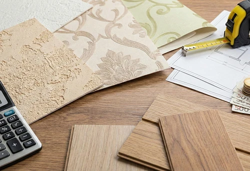 Samples of decorative materials and panels for calculating wall finishing costs