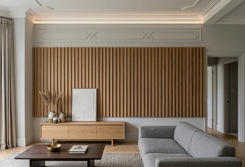 Living room with 3D slatted panels on the wall and stucco decor in a calm architectural interior