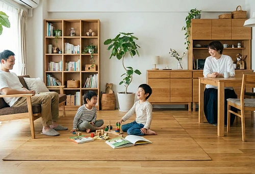 Family with Children in a Bright Apartment with Wooden Furniture and Plants: Healthy Environment and Epigenetics of Space