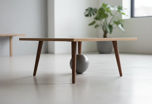 Coffee Table with Wooden Legs in a Minimalist Interior
