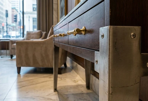 Furniture handles in hotel interiors &mdash; durable metal fittings for hotel furniture with intensive use