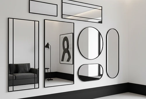 Composition of mirrors in thin black frames on a white wall with a high dark baseboard in black graphics style
