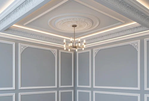 Elegant polystyrene ceiling ensemble with cornices, skirting boards, and moldings in a classic interior