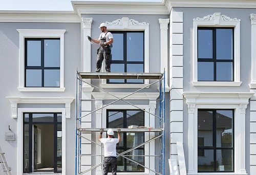 installation of polyurethane facade decor on an external house wall