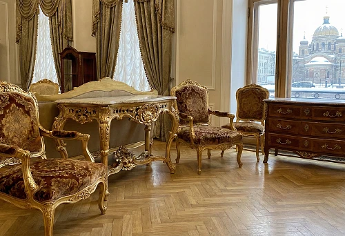 Baroque Furniture in a Classic Hall: Carved Gilded Armchairs and Ornamented Table, Parquet and Tall Windows