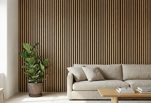 Wooden slats for wall: accent wall made of vertical lamellas behind the sofa in a bright living room, natural wood texture.