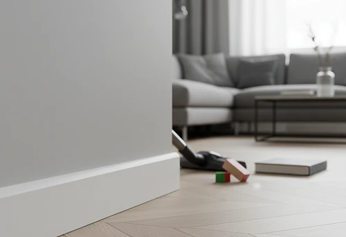 White Impact-Resistant Polystyrene Skirting Board in a Modern Interior with Parquet Flooring
