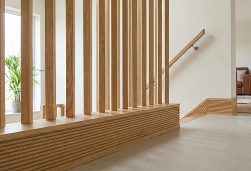 Modern Interior 2026 with Vertical Wooden Balusters and Wide Baseboards