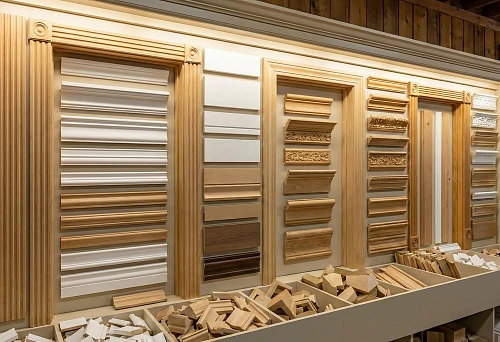 Stand with moldings for interior doors: samples of door trim for framing the opening without replacing the frame
