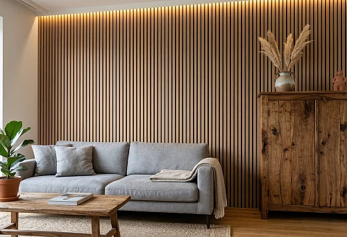 Wood-look wall slat panel in a living room interior with a sofa and warm lighting