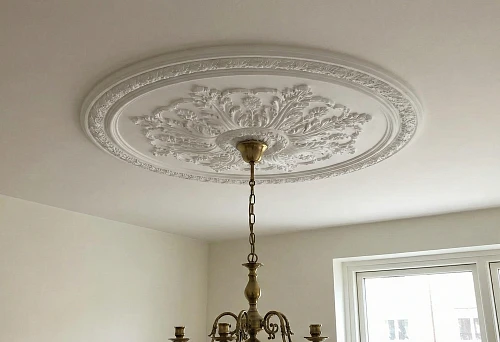 Polyurethane stucco for chandelier: ceiling rosette with ornament around the light fixture mount