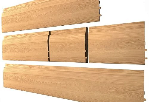Three wooden baseboards with grooves and tongues on a white background, showcasing variety of sizes and textures