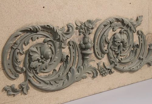 Three-dimensional ornament with plant motifs &ndash; elegant decorative element for walls.