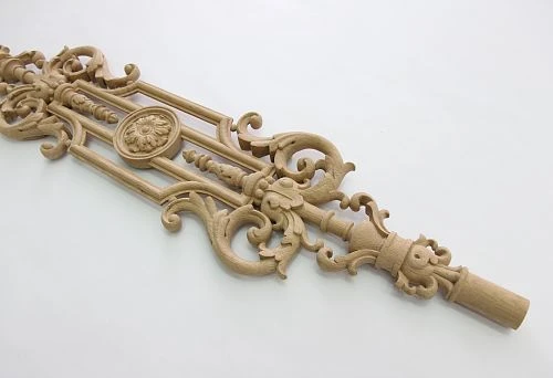 Carved wooden baluster with elegant ornamentation and classic decor.