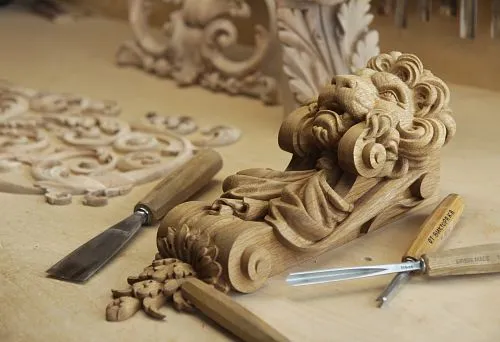 Masterfully crafted wood carving with ornamental elements, reflecting the traditions of handcrafting.