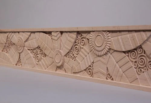 Decorative wooden door casing with carved ornament
