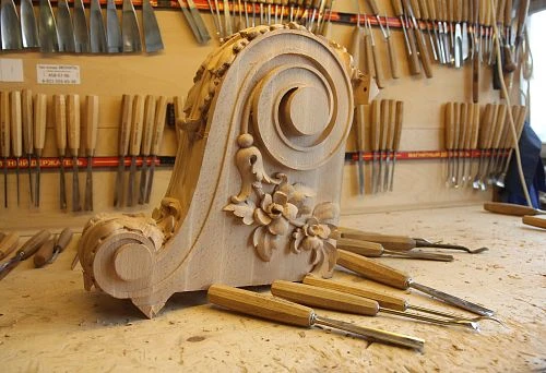 Wood carving: detailed ornament with elements of classical design.