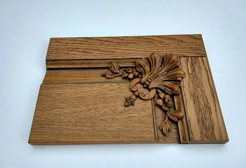 Decorative panel with carved ornament for living room interior
