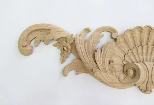 Wooden carved decorative element with refined floral ornament for interior and facade