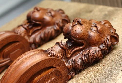 Mudboard detailing: Wood carving as a source of aesthetics.