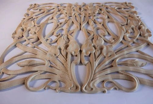 Ornate Wooden Overlay Decor with Flowers and Flowing Lines