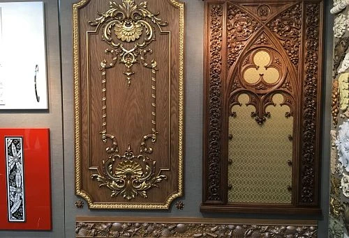 Classic wooden panel with gilded decoration and carving