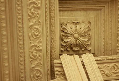 Carved wooden panels and moldings for updating and repainting furniture