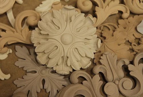 Decorative wooden appliqu&eacute;s &mdash; classic ornament for decorating walls and furniture.