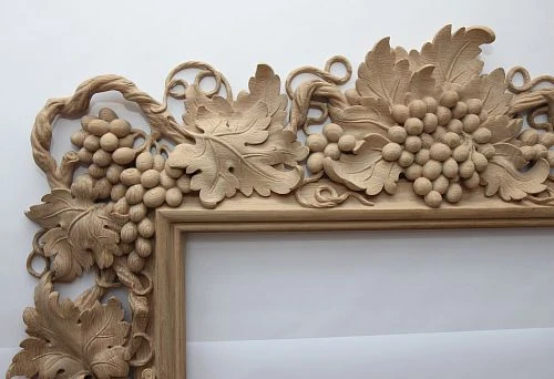 Carved wooden frame with grapevine for picture decoration