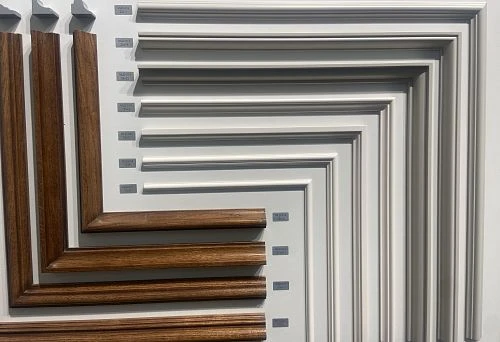 Collection of wooden frames and moldings in classic style, available in various shades and sizes.