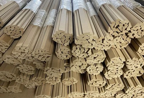 Folded wooden baseboards and moldings for finishing