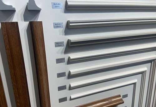 Set of decorative wooden strips of various shapes and shades, displayed at the stand